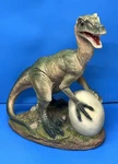 Velociraptor Egg Beater Design Toscano Dinosaur Statue 15 High. Fixed Price $85.99.