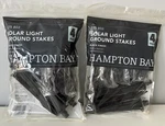 New Hampton Bay Solar Light Ground Stakes Packs Total Black Finish 275803. Fixed Price $21.14.