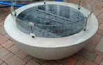 Outdoor Greatroom Cove 42-INCH Gas Fire Pit Bowl W/ Wind Screen And Gem Rocks. Fixed Price $1800.00.