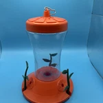 Opus Hanging Feeder Plastic Orange Clear Outdoor Garden Birdseed. Fixed Price $6.99.