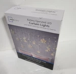 Mainstays 144-COUNT Led Curtain Lights Stars & Moons Battery Operated Warm White. Fixed Price $19.99.