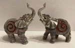 Feng Shui Pair Of Lucky Elephant Family Statues With Spiral Design. Fixed Price $24.95.