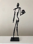 Rockledge Design Studios Contemporary Metal Statue Of Man Holding Skull, 20". Fixed Price $175.00.